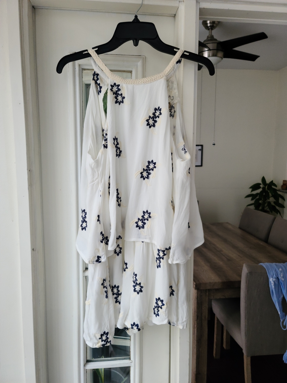 Sadie & Sage White Romper with Navy Floral Embroidery